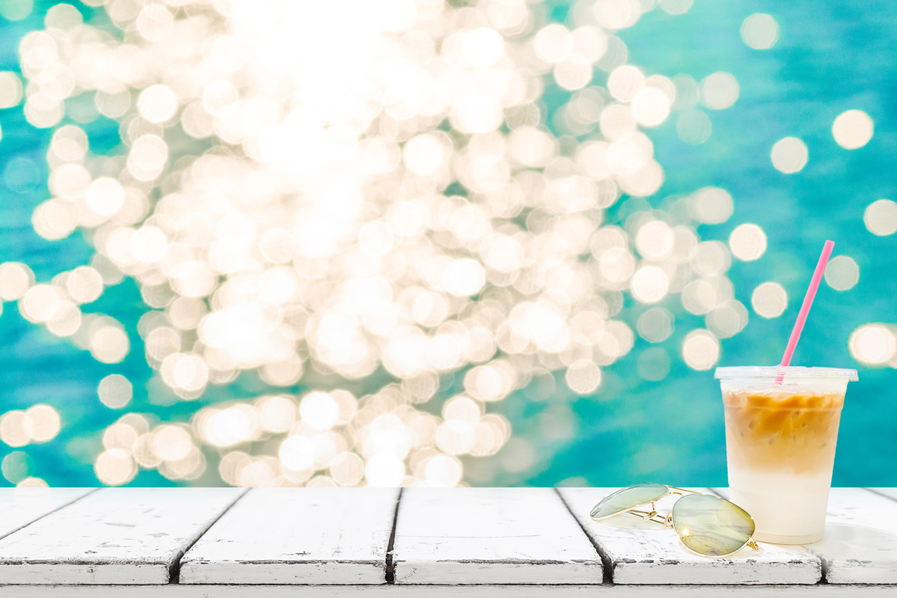 ice drink and sea background summer time